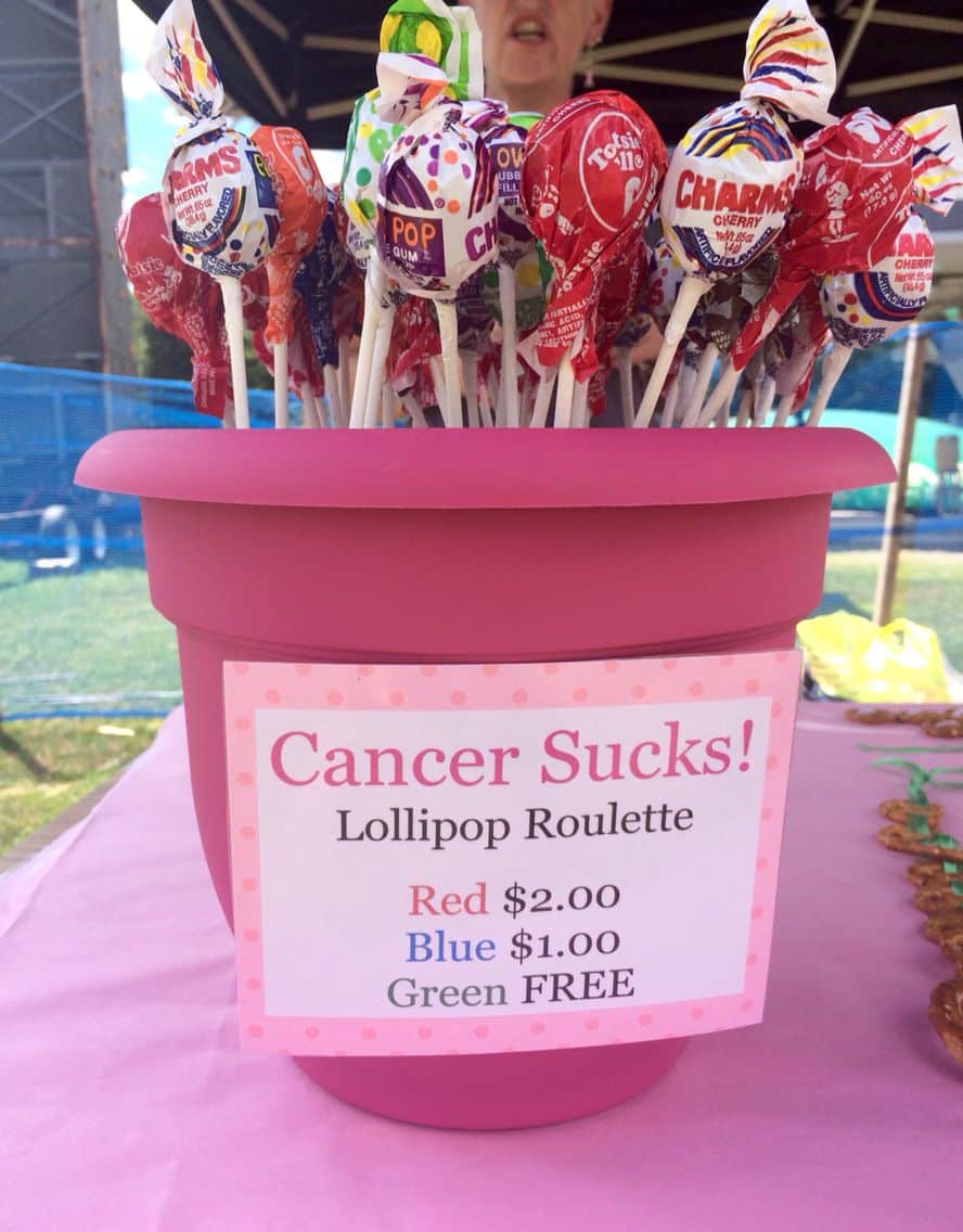 Cancer sucks! Cancer blows! Lollipop roulette. #komen3day
